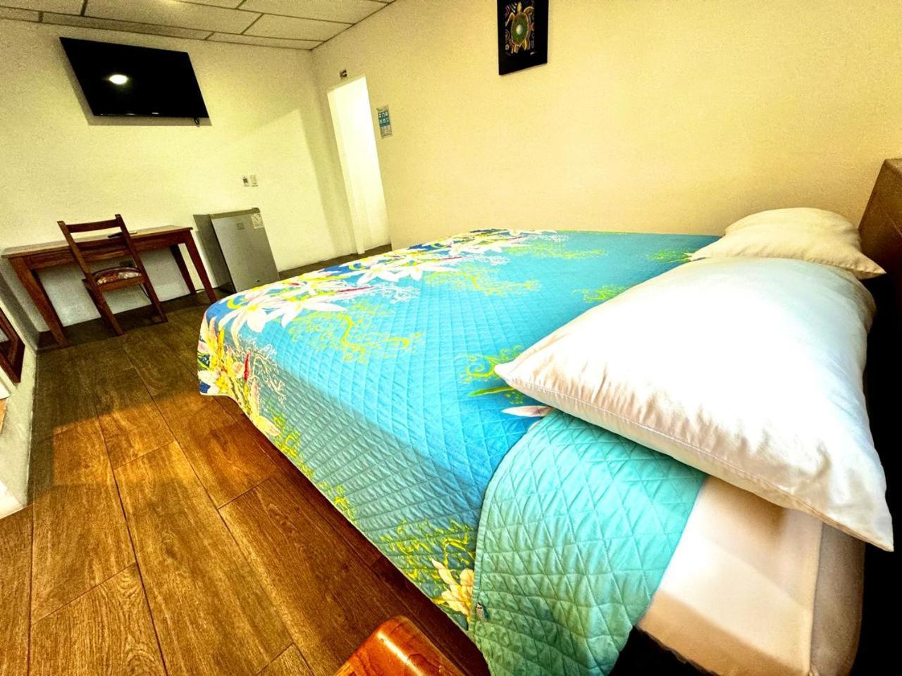Hostal Muyuyo プエルトアヨラ エクステリア 写真