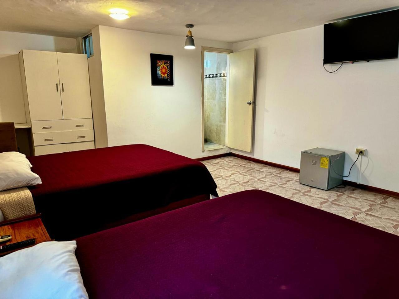 Hostal Muyuyo プエルトアヨラ エクステリア 写真